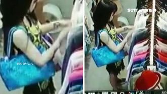 長髮氣質女偷水鑽別針　遭逮死不認錯