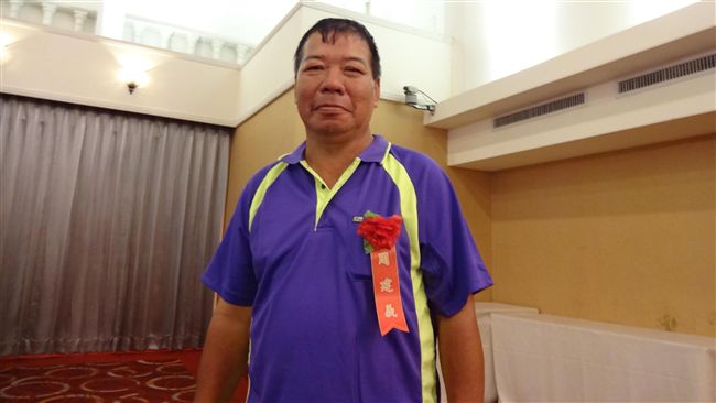 上養父下育子　周建義不喊苦獲孝行獎