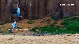 地表破壞王！男拍照耍帥單手掛玄武岩