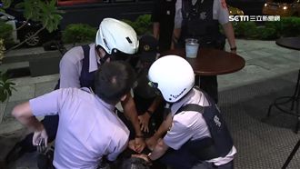 韓男喝醉鬧事　揮拳襲警遭壓制上銬