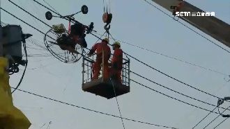男子玩飛行傘　意外倒吊8尺高電線上
