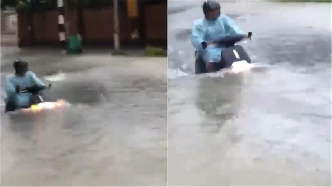 超威！電動摩托車　神穿越積水道路