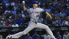 大都會先發投手迪格隆飆出近100英哩速球。（圖／美聯社／達志影像）