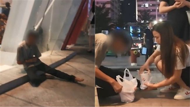 流浪漢餓癱坐路邊！天使正妹買食送上