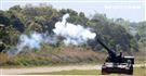 108年「國防知性之旅—龍翔營區開放」特戰突擊車、偵蒐機車對敵實施攻擊。（記者邱榮吉/新社拍攝）