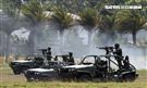 108年「國防知性之旅—龍翔營區開放」特戰突擊車、偵蒐機車對敵實施攻擊。（記者邱榮吉/新社拍攝）