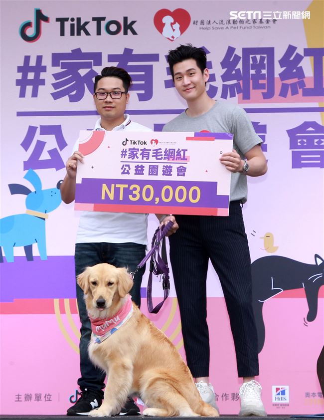 周興哲抽空現身公益活動，為毛小孩發聲，「愛他，請不要遺棄他」。（記者/邱榮吉攝影）