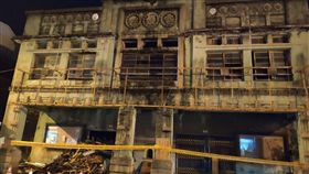 台南麻豆電姬戲院整修建物惹議（1）被台南市政府列為歷史建築的麻豆電姬戲院近日疑有拆除工程進行，引發地方民眾關注，擔心文化資產受損。中央社記者楊思瑞攝  108年6月11日