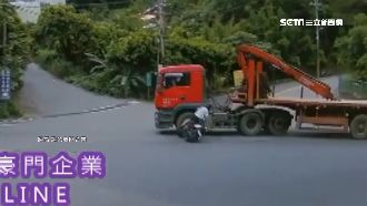 山區盲彎狂飆　騎士撞曳引車險喪命