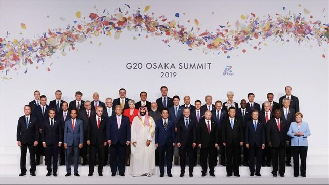 G20大合照樂融融　川習握手致意