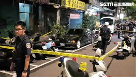 台北市中正二分局泉州所警員逮捕沈姓通緝犯，反遭對方持刀劃傷，只好連開2槍將人制伏（翻攝畫面）