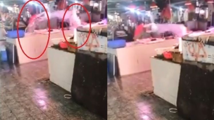高雄魚販上演潑水戰！紅衣婦灌7盆水