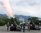 「0102殉職將士」聯合公祭現場會以19響「矧砲」送車隊離開。（記者邱榮吉/攝影）