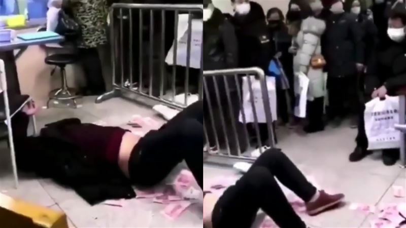 武漢肺炎慌　男醫院撒錢躺地沒人理