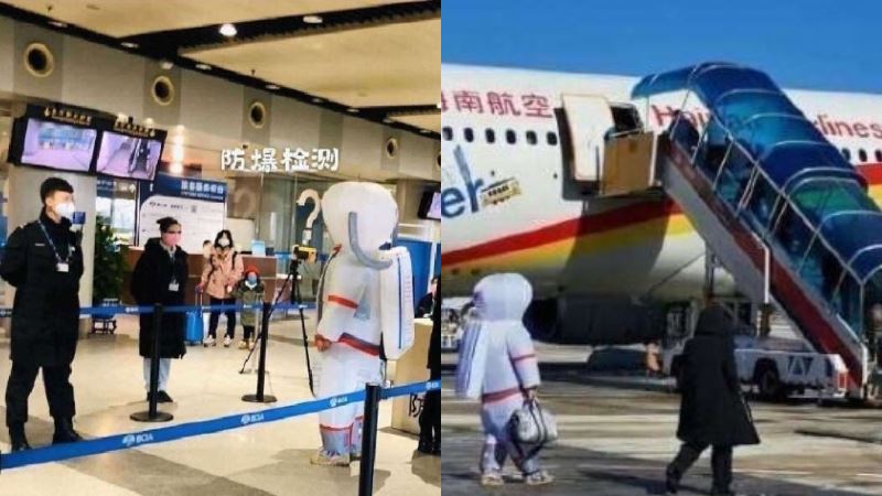 他穿「太空裝」上飛機　無死角防飛沫