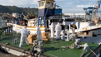 憂走私客有病毒　海巡穿防護裝抓私菸