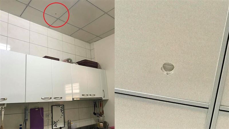 正妹開氣泡酒　砰！天花板被射穿了