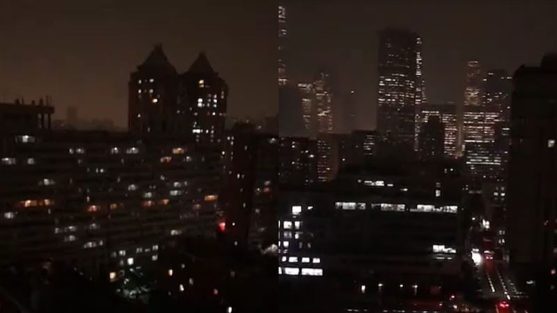 中國兩會開議　北京瞬間變黑夜下暴雨