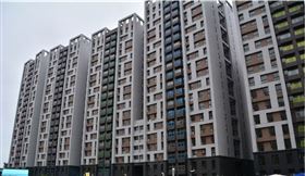 林口世大運社會住宅1日公告招租，將採隨到隨辦、分梯入住，經過資格審核後，每月25日簽約點交，2個月內就可入住圖為林口世大運社會住宅外觀。（中央社檔案照片）