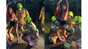 面對3名消防員包圍救援，拉雅妮露出尷尬神情。（圖／翻攝自swn推特）