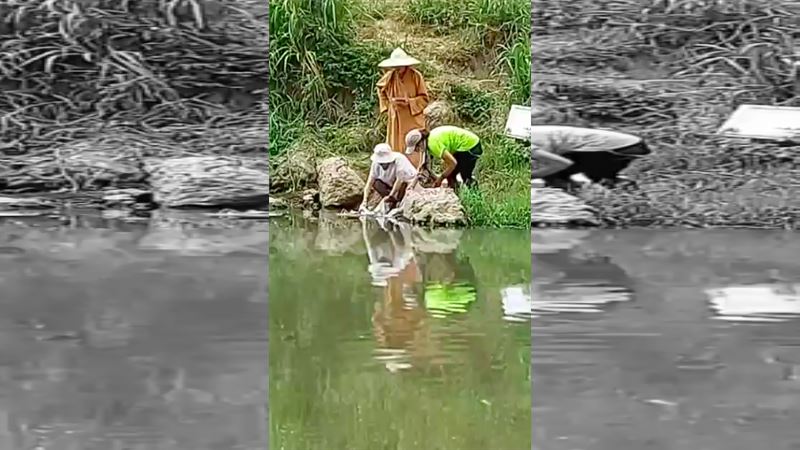 1法師＋2女放生？細長滑溜生物入溪