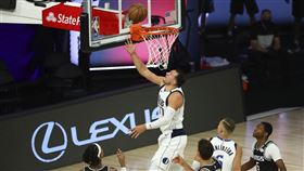 ▲獨行俠東契奇（Luka Doncic）34分20籃板12助攻，成為NBA最年輕30分、20籃板「大三元」締造者。（圖／美聯社／達志影像）