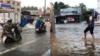 豪雨猛炸南台灣　騎士牽車涉水