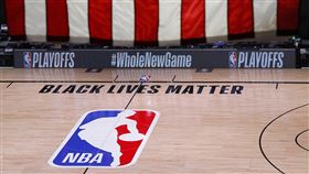 ▲喬丹（Michael Jordan）居中協調，球員決定打完季後賽。（圖／美聯社／達志影像）