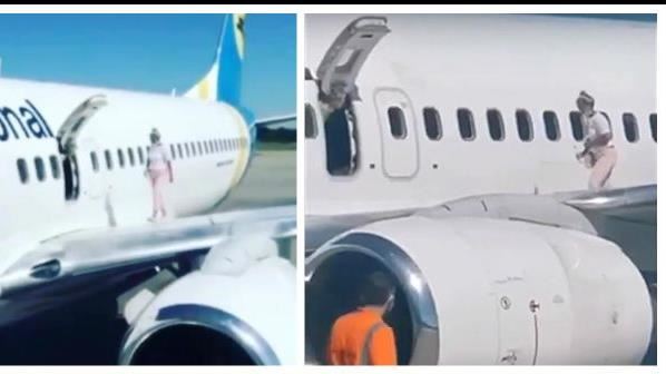 飛機落地…超狂大媽開門走上機翼漫步