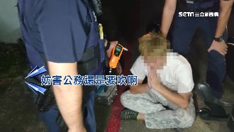 沒開車燈被警盯　男攔查不停狂騎自摔