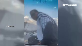 詭男敲窗狂罵　跳坐引擎蓋嚇壞女駕駛