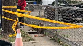 台中七期朝富路上，男卡水溝，相驗，。(圖／翻攝畫面)