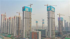 杭州規模超越南京　躍為長三角第二大城中國官方近日公布，在長江三角洲地區，杭州人口規模超越南京，躍為僅次於上海的第二大城市。圖為杭州正在興建的2022年亞運會亞運村。（中新社提供）中央社　110年1月12日