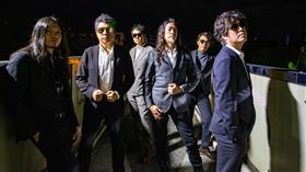 董事長樂團和四分衛/Legacy提供