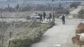 ▲孫姓婦人遭7名特勤毆打。（圖／翻攝自微博影片畫面）