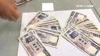 清潔隊員拆彈簧床　噴出69張千元鈔