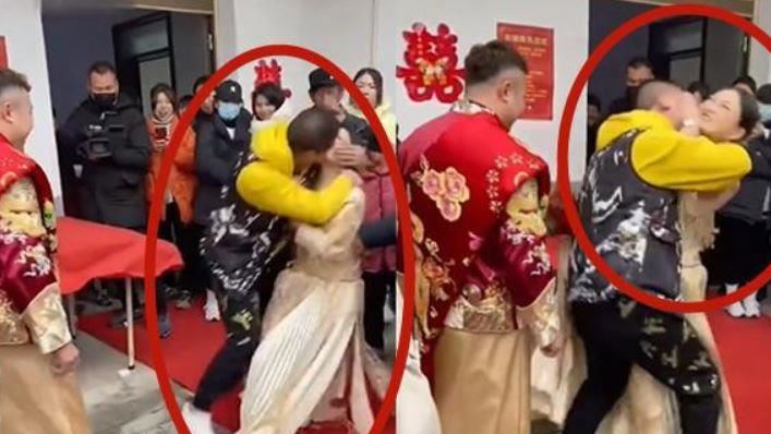 老婆當眾被吻猛掙扎　新郎見狀竟笑了