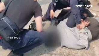 男肇逃遭通緝　神明面前被警圍捕壓制