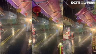 日月潭下傾盆大雨　商家撐傘歡呼尖叫