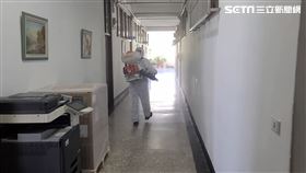 台北市文山一分局進行消毒工作。（圖／翻攝畫面）