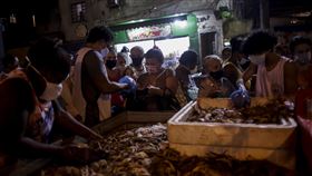 新冠肺炎疫情影響巴西經濟。（圖／美聯社／達志影像）