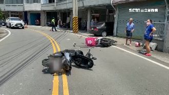 騎士過彎壓雙黃線　撞女外送員致骨折