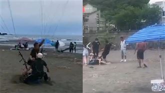 降落撞到遊客　飛行傘教練遭痛毆