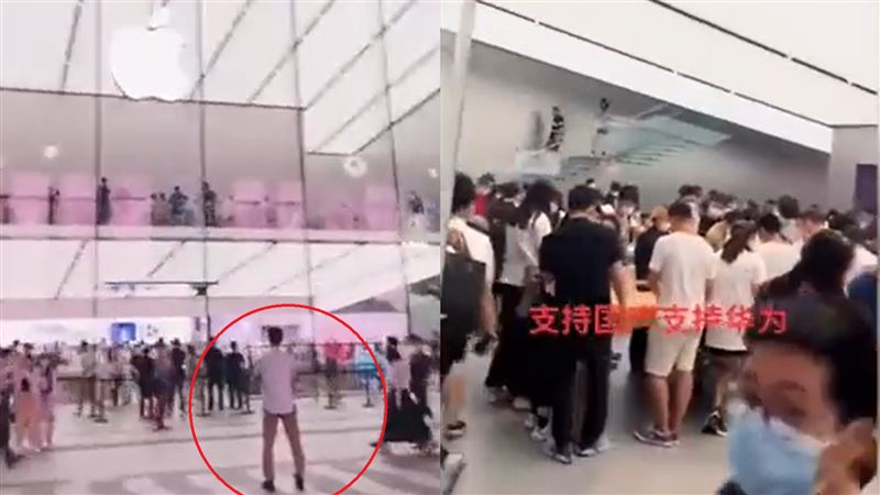 男站蘋果店外：支持國產…果粉不甩！