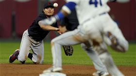 ▲張育成游擊區秀飛撲美技。（圖／美聯社／達志影像）