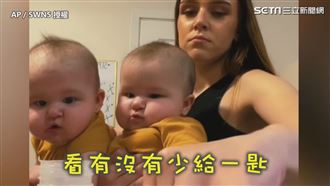 9公斤雙胞女巨嬰　４眼直盯媽咪泡奶