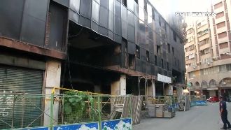 鼻酸！同住城中城遭火噬　子亡母命危