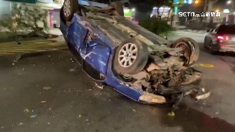 疑太快失控　酒駕男轎車飛越分隔島