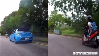 騎士媽載幼子睡著了　汽車暖閃燈護送