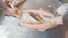 小卷肚中有菸蒂